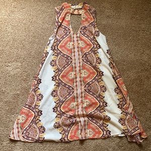 Small orange, burgundy, and white dress